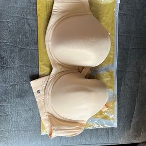 Nude new strap less bra never used